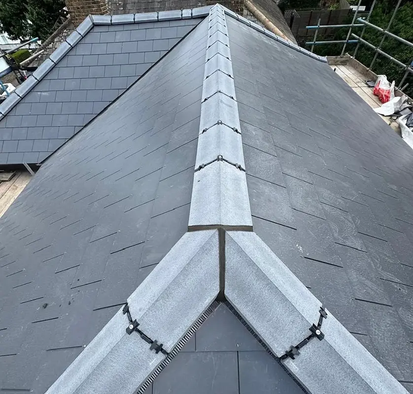 Hand-dressed milled lead parapet capping and dormer flashing in Central London