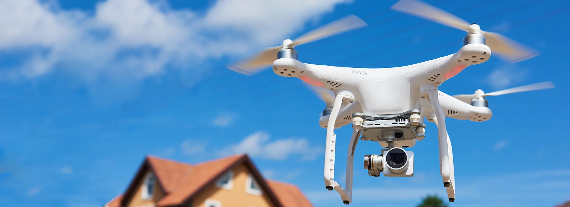 CAA-licensed inspection drone surveying a pitched London roof