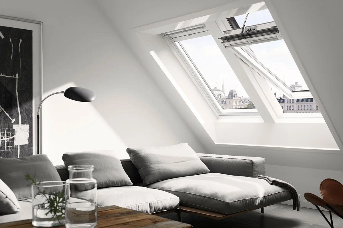 Triple VELUX Certified skylight installation flooding a London loft with daylight